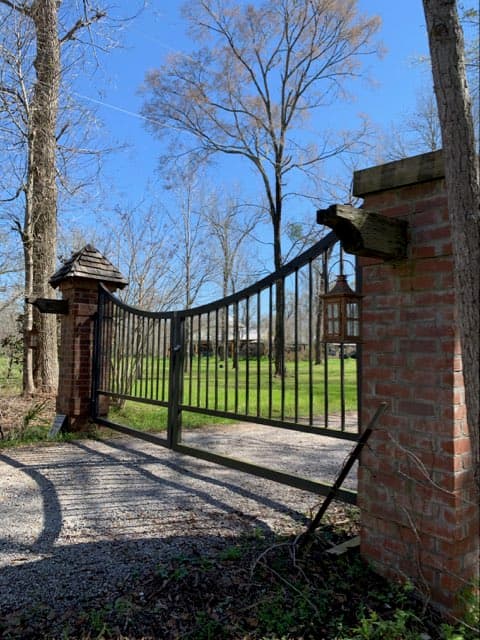 Custom driveway gate with iron details